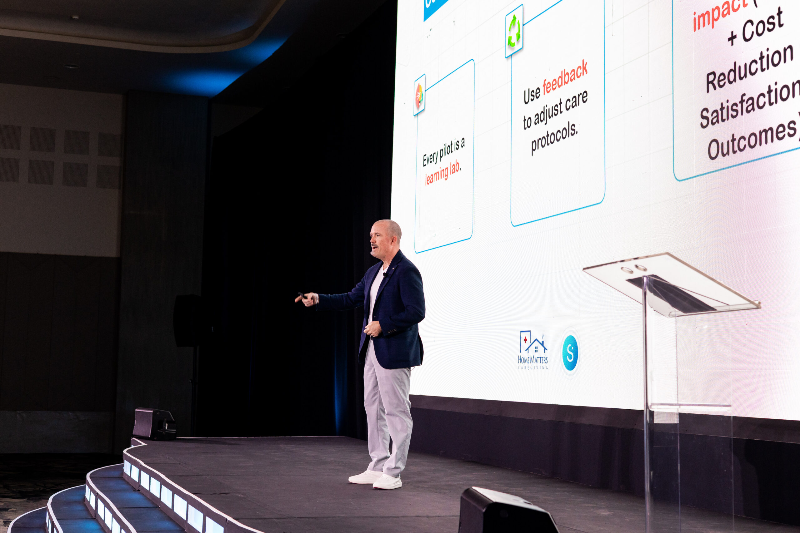 Clay Foutch is a man giving a presentation on stage