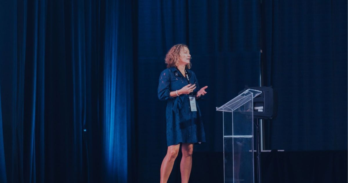 susan-kahlau on stage at a sensi event: readmission rates