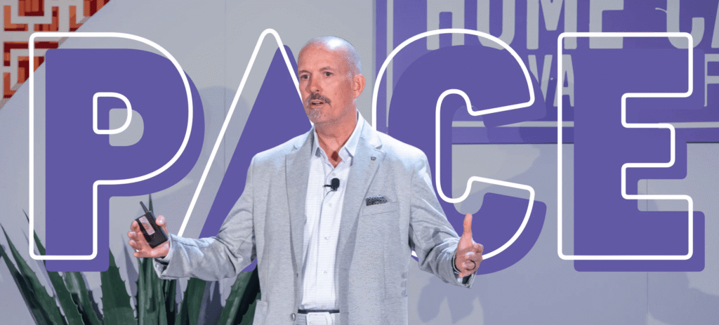 Clay Foutch of Home Matters Caregiving in front of screen that has PACE on it