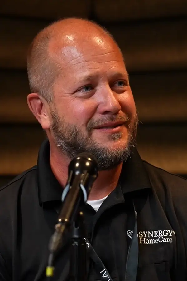 Alan Wikman speaking on a podcast