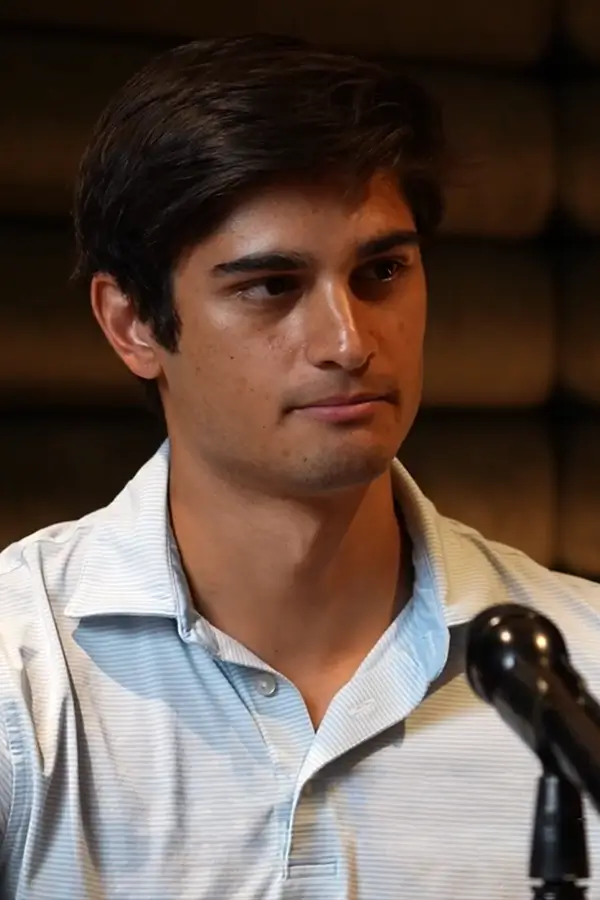 Conrad Pereira speaking on a podcast